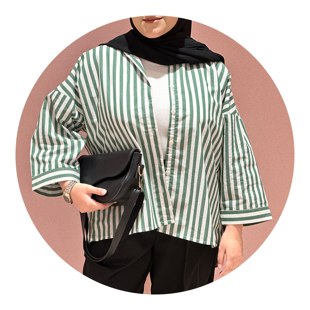 Green and white striped oversized button-down shirt for modest wear